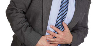 man clutching