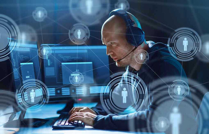 Man with headset working at computer holographic icons