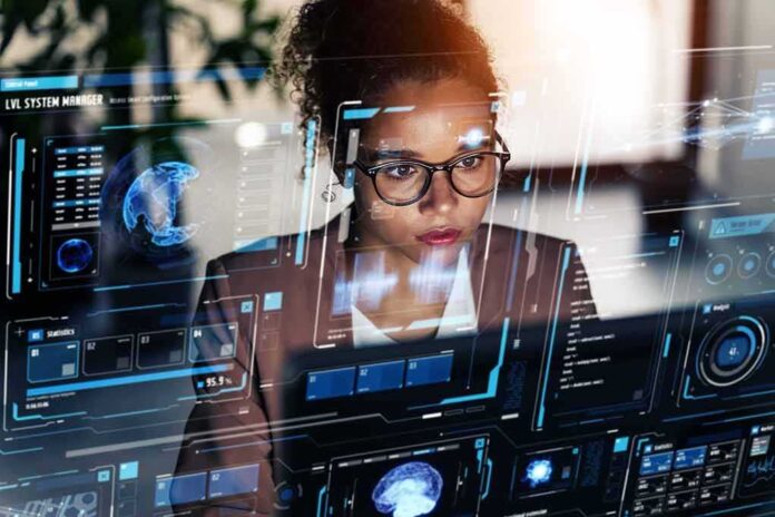 shutterstock_2312841725.jpg A woman analyzing data on a futuristic digital interface