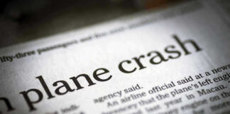 Newspaper headline about a plane crash story