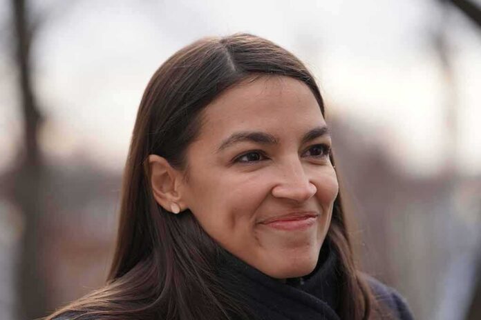 A smiling woman with long dark hair in a casual outdoor setting
