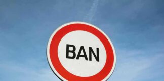 A road sign displaying the word 'BAN' against a blue sky