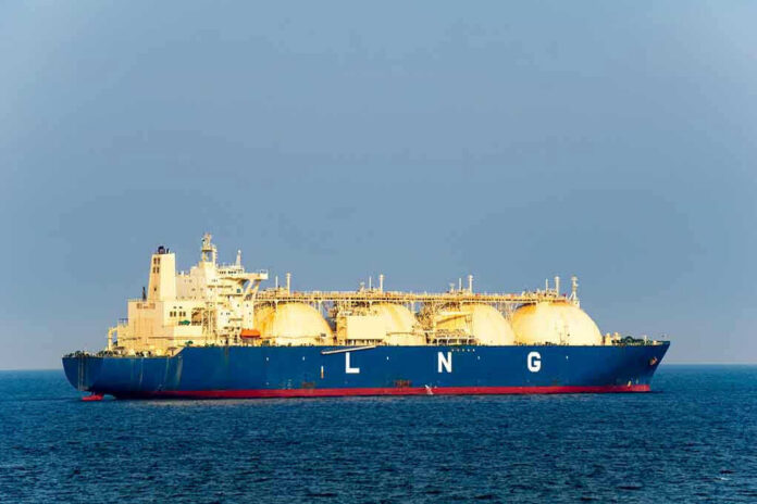 LNG tanker ship sailing on open sea.