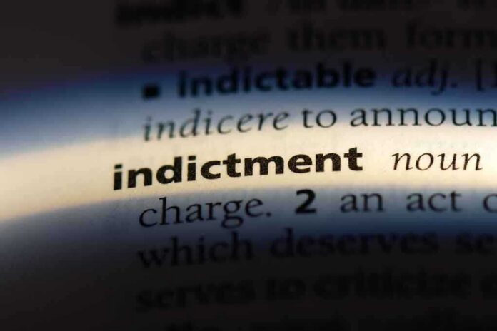 shutterstock_1155452680 (2).jpg Close-up of a dictionary page showing the word 'indictment' and its definition