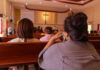 Pope ABANDONS 2,000 Years of CHURCH TEACHINGS People sitting in church pews during service.